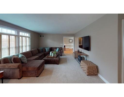 24 Birch Brush Road Shrewsbury, MA 01545 - Photo 3 of 27 a living room with furniture and a flat screen tv