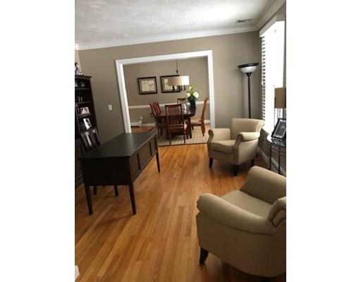 24 Birch Brush Road Shrewsbury, MA 01545 - Photo 8 of 27 a living room with furniture and a wooden floor