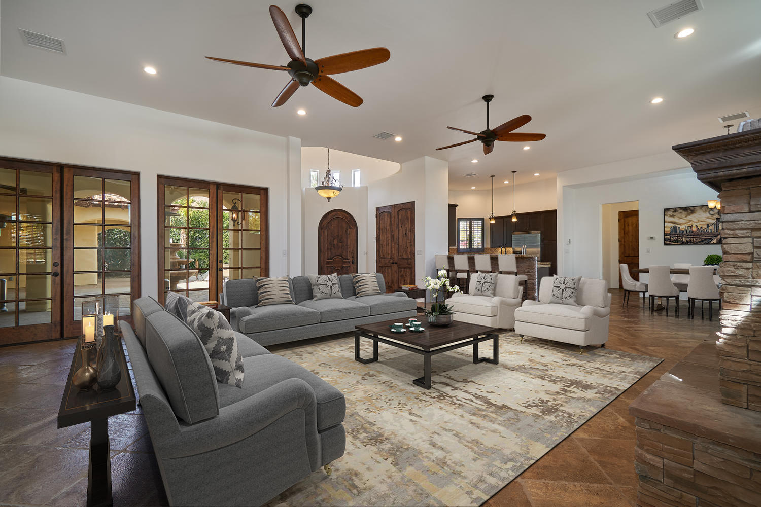 695 West Racquet Club Road Palm Springs, CA 92262 - Photo 12 of 50 a living room with furniture ceiling fan and a rug