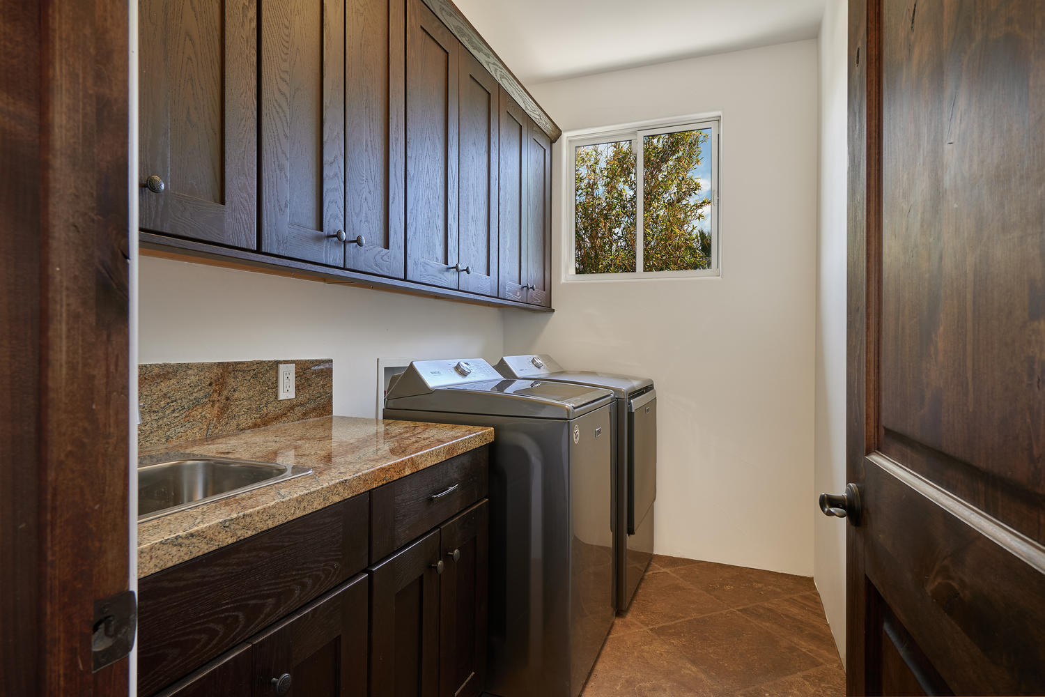 695 West Racquet Club Road Palm Springs, CA 92262 - Photo 18 of 50 a utility room with sink dryer and washer