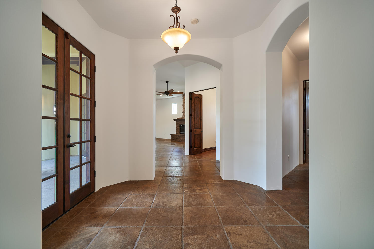 695 West Racquet Club Road Palm Springs, CA 92262 - Photo 20 of 50 a view interior of a house with a chandelier fan and windows