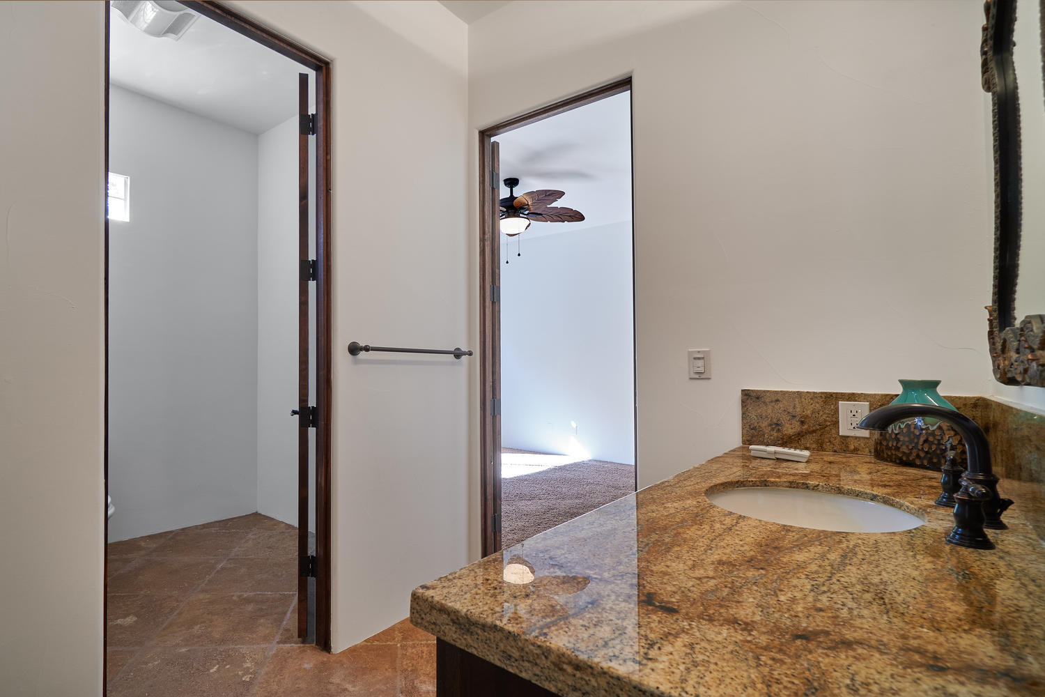 695 West Racquet Club Road Palm Springs, CA 92262 - Photo 26 of 50 a bedroom with a bed and a mirror