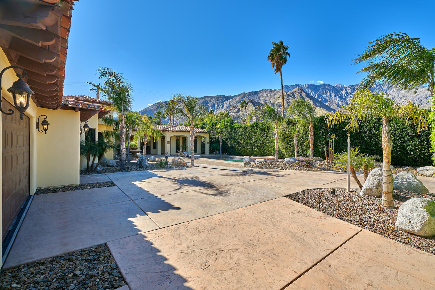 695 West Racquet Club Road Palm Springs, CA 92262 - Photo 4 of 50 a view of a house with a patio