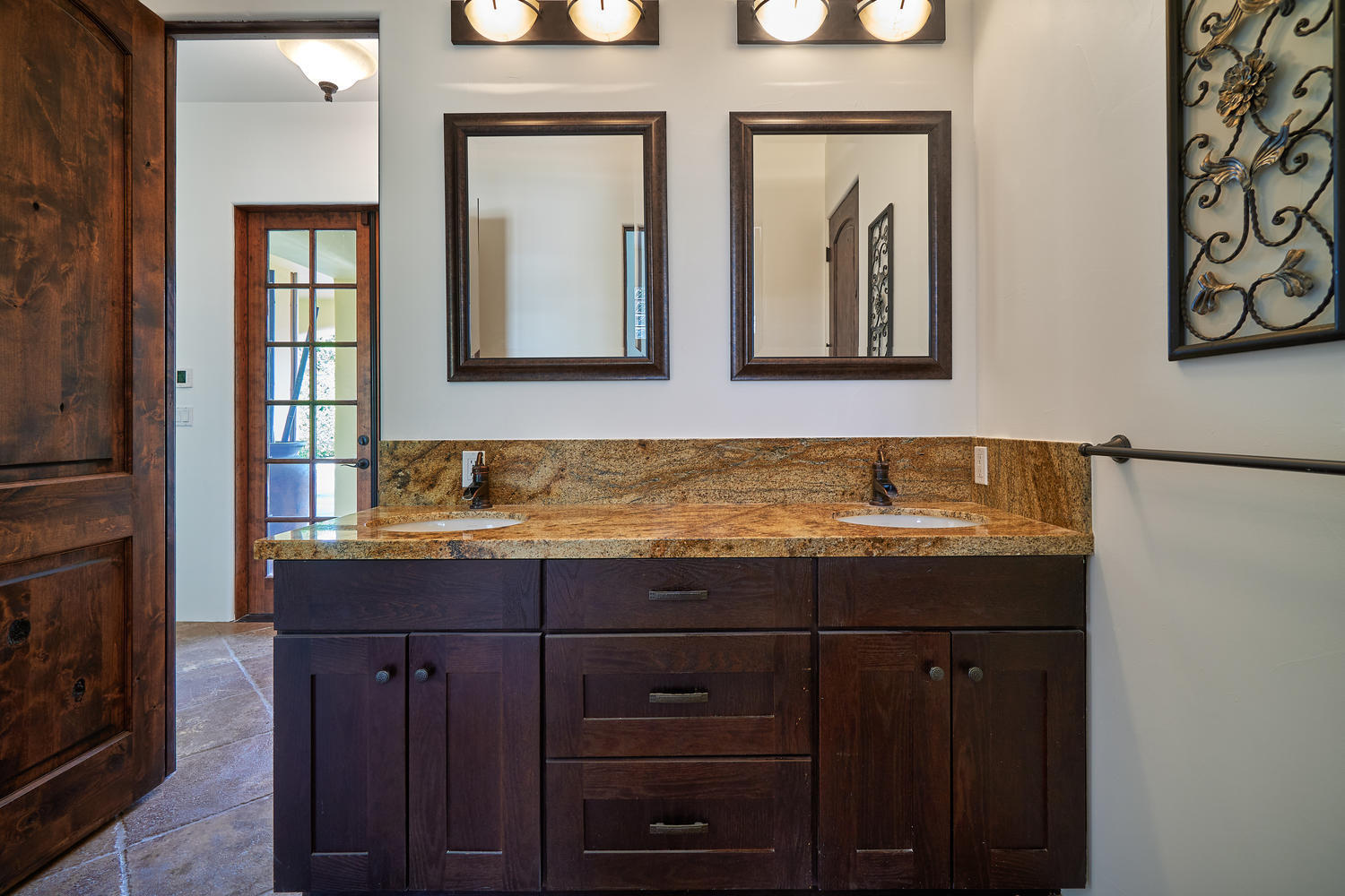 695 West Racquet Club Road Palm Springs, CA 92262 - Photo 35 of 50 a bathroom with a granite countertop sink and a mirror