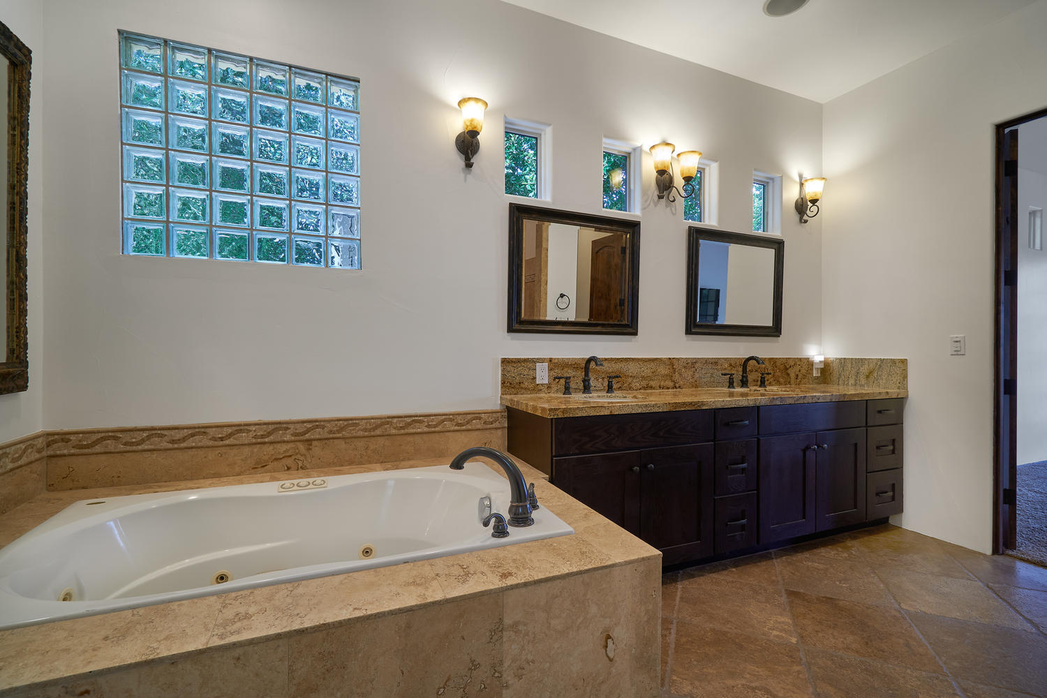 695 West Racquet Club Road Palm Springs, CA 92262 - Photo 45 of 50 a bathroom with a tub sink and mirror