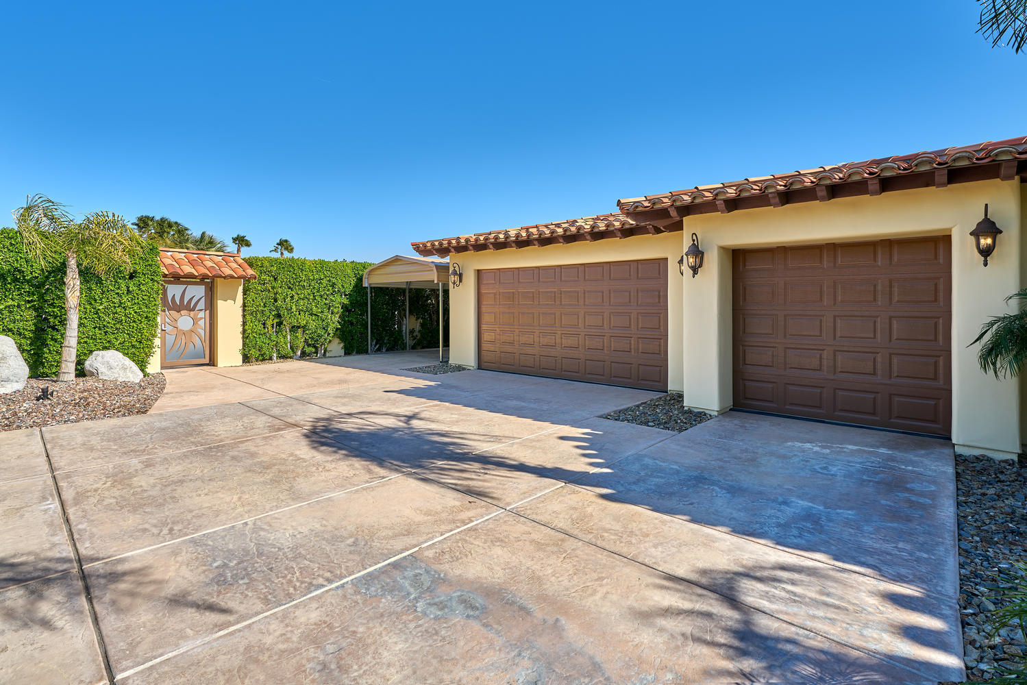 695 West Racquet Club Road Palm Springs, CA 92262 - Photo 6 of 50 a view of a house with a garage