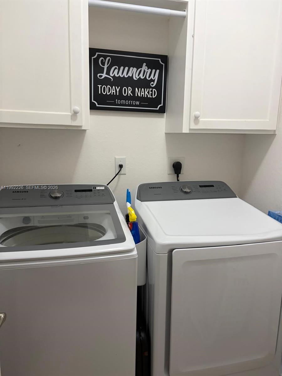 24982 Southwest 118th Court Homestead, FL 33032 - Photo 16 of 51 a utility room with dryer and washer