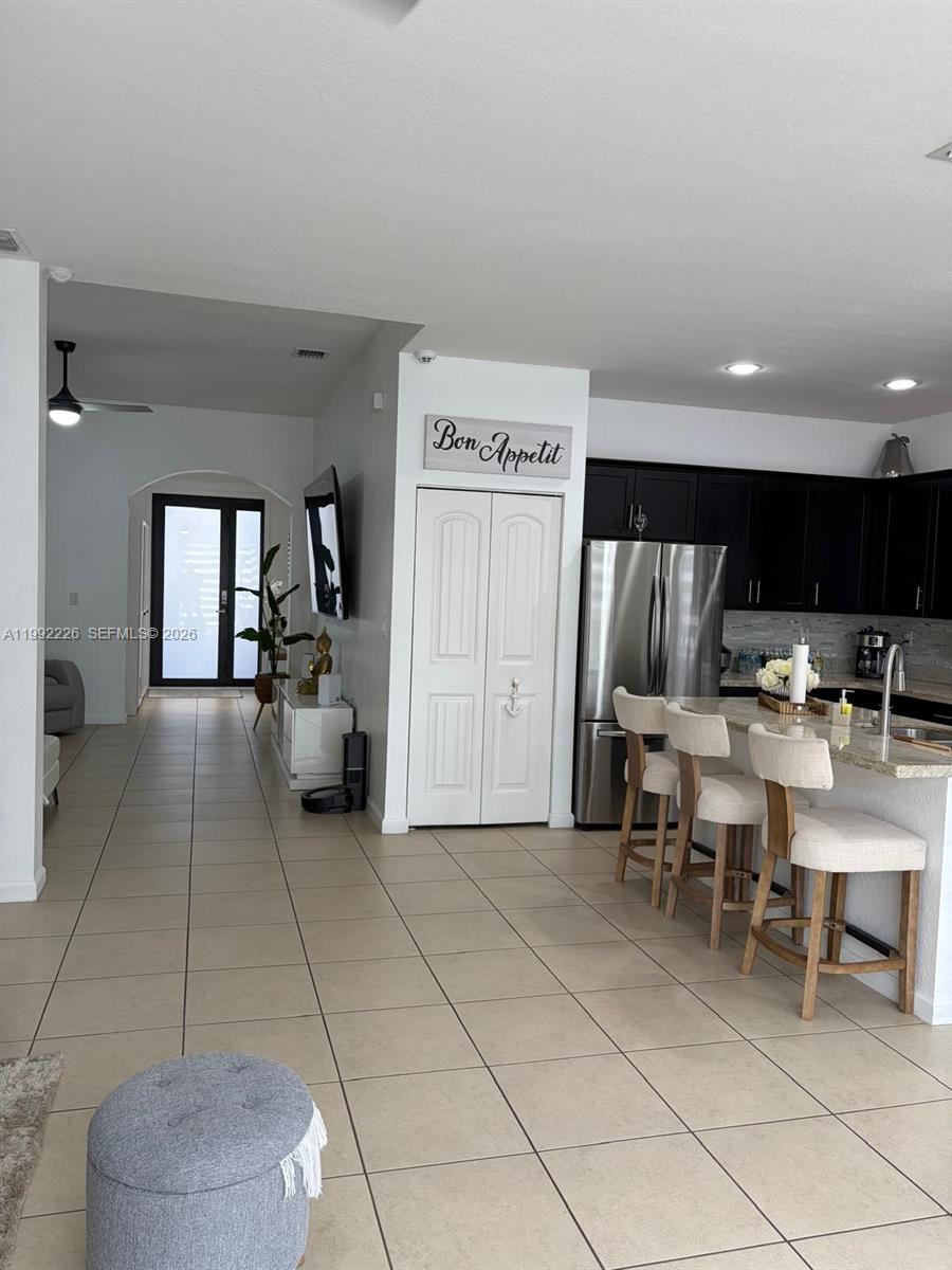 24982 Southwest 118th Court Homestead, FL 33032 - Photo 31 of 51 a view of kitchen with furniture and window