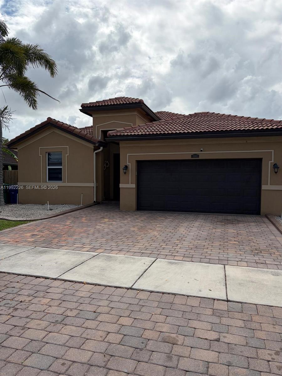 24982 Southwest 118th Court Homestead, FL 33032 - Photo 38 of 51 a front view of a house