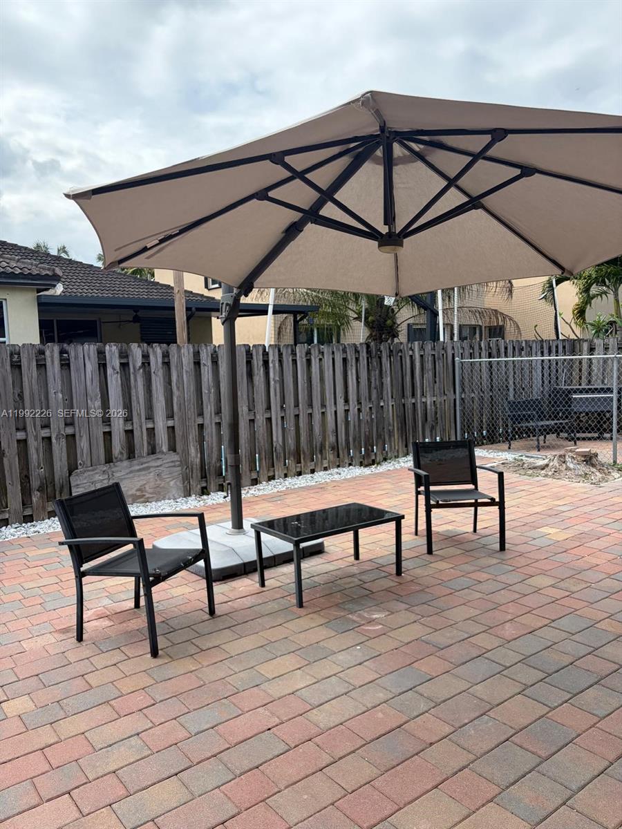 24982 Southwest 118th Court Homestead, FL 33032 - Photo 40 of 51 a view of outdoor space with seating