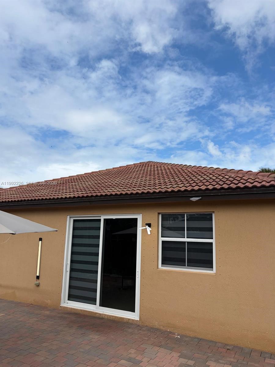 24982 Southwest 118th Court Homestead, FL 33032 - Photo 41 of 51 a front view of a house