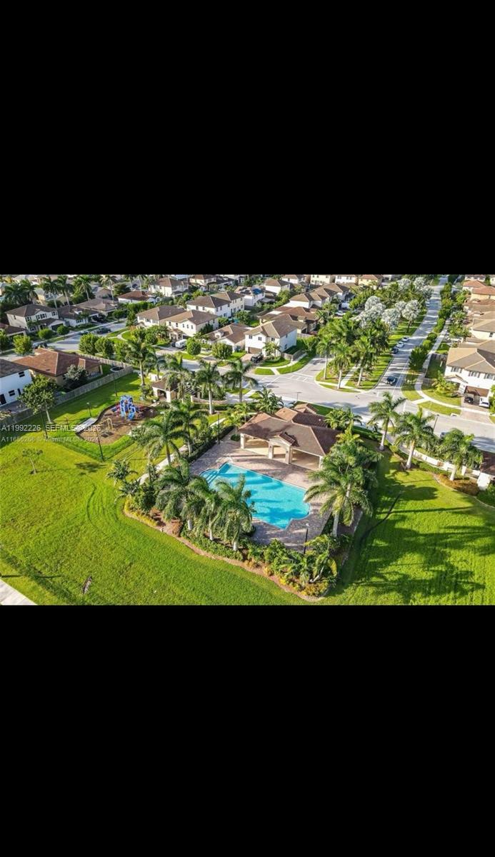 24982 Southwest 118th Court Homestead, FL 33032 - Photo 51 of 51 a view of an outdoor space and swimming pool