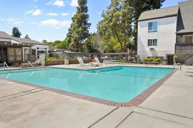 a view of a house with sitting area and furniture