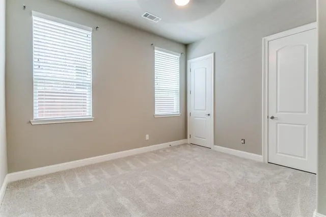 a view of an empty room with window