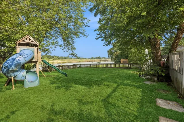 a view of a golf course with a swimming pool