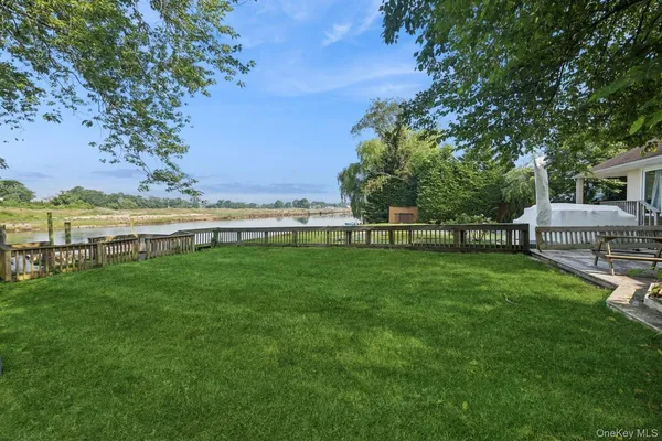 a view of a garden with an ocean