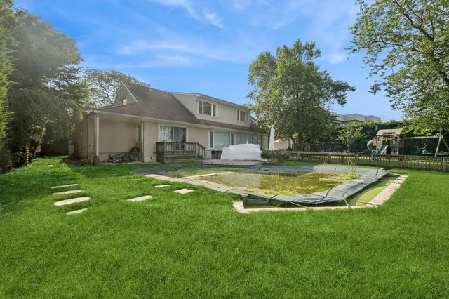 a view of a house with a swimming pool