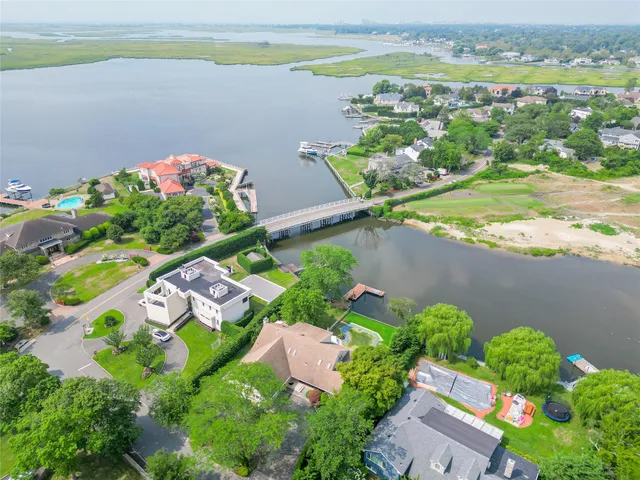 an aerial view of a houses with outdoor space