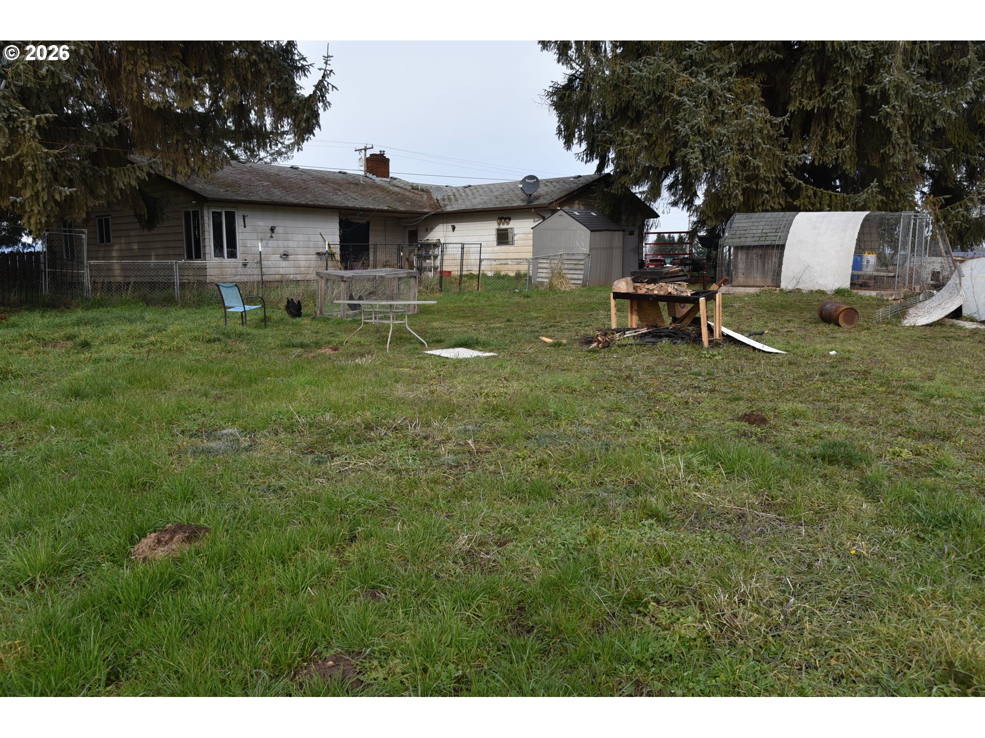 3678 Southwest Golf Course Road Cornelius, OR 97113 - Photo 12 of 14 a view of a house with a back yard
