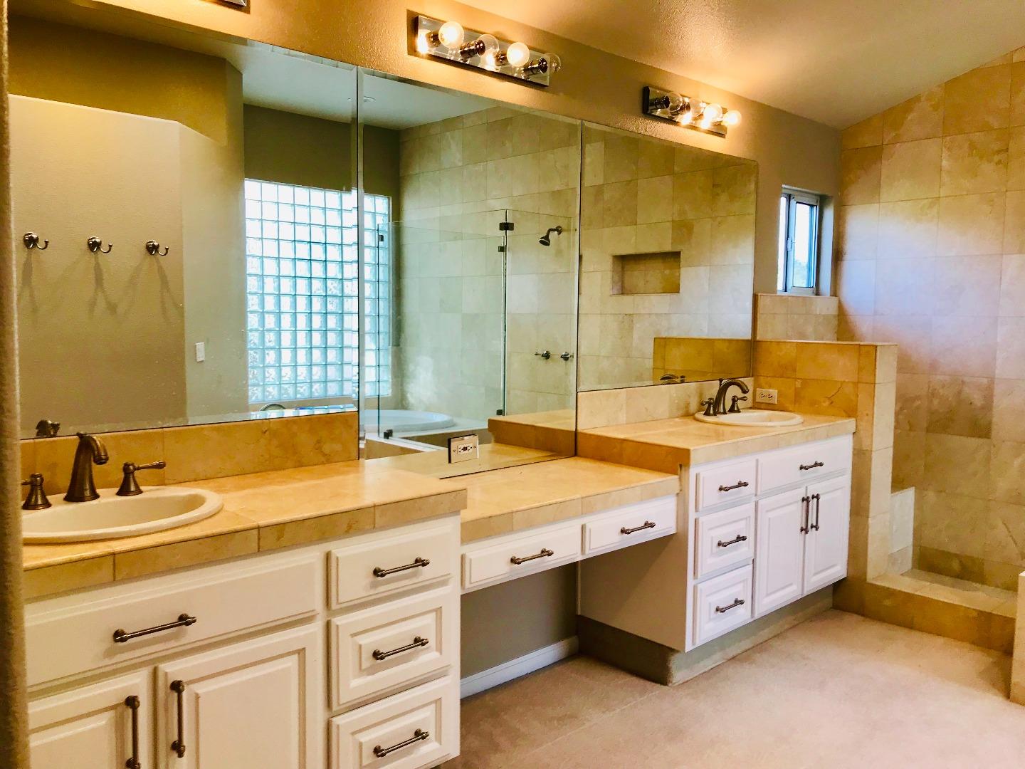 Foligno Way San Jose, CA 95138 - Photo 12 of 22 a spacious bathroom with double vanity and a mirror