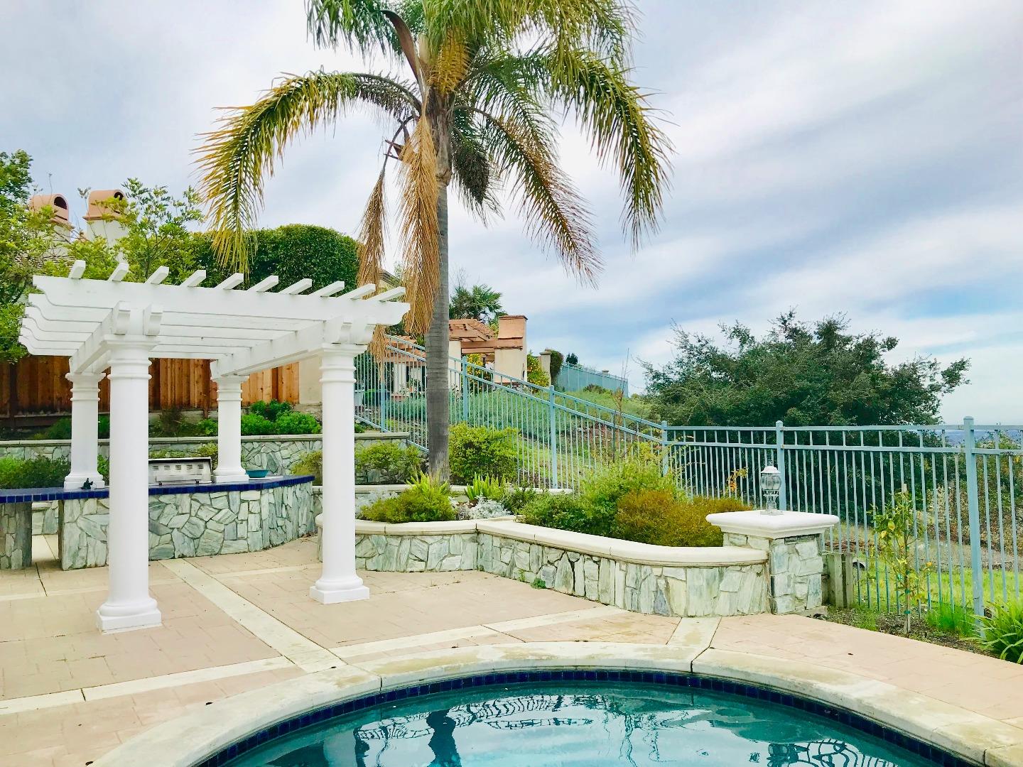 Foligno Way San Jose, CA 95138 - Photo 17 of 22 a view of a lake with couches chairs