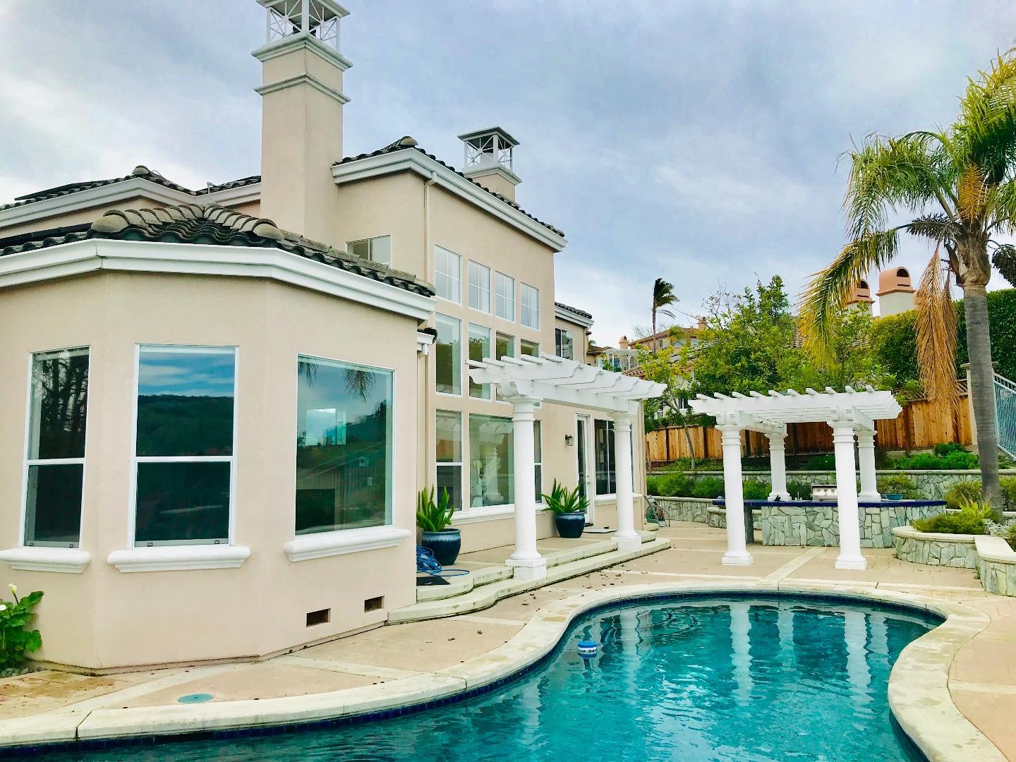 Foligno Way San Jose, CA 95138 - Photo 19 of 22 a view of a white building with a swimming pool