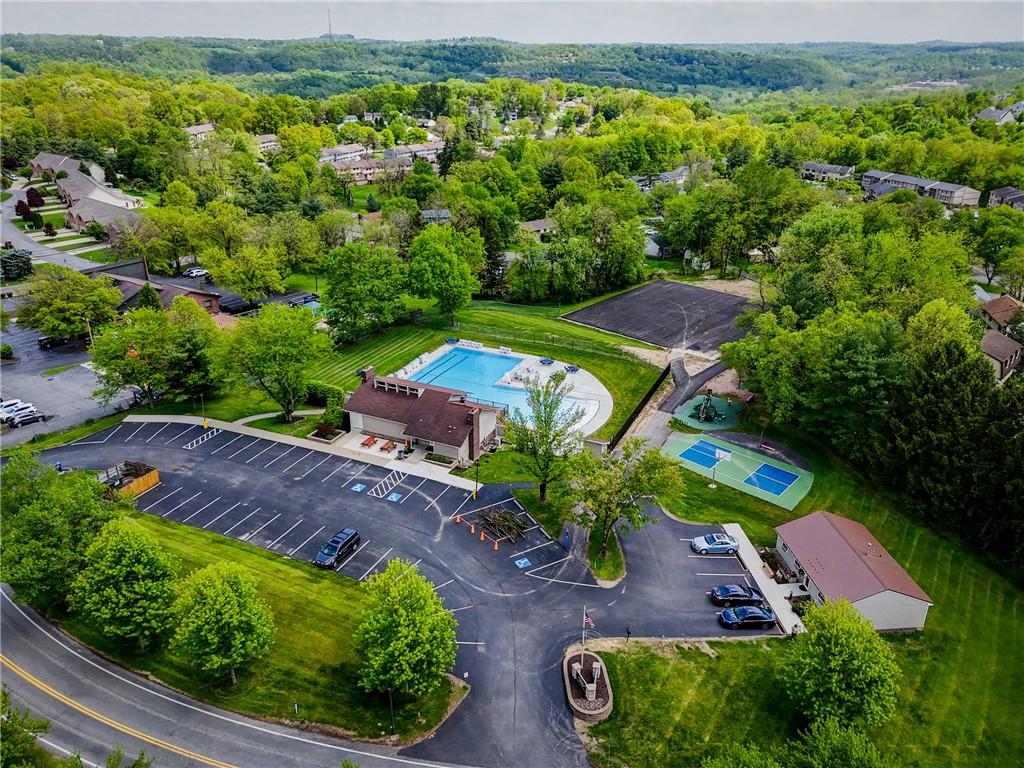 329 Ridge Point Circle, Unit 33 Bridgeville, PA 15017 - Photo 29 of 32 an aerial view of a house with a garden