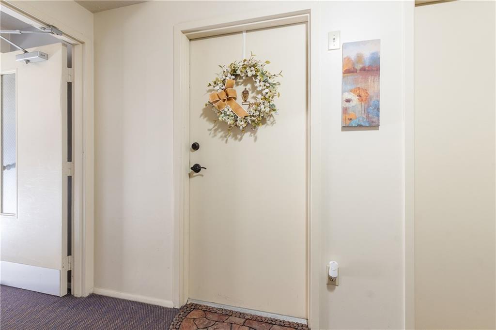 329 Ridge Point Circle, Unit 33 Bridgeville, PA 15017 - Photo 3 of 32 a view of elevator with hallway