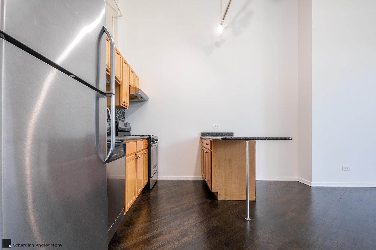 500 South Clinton Street, Unit 130 Chicago, IL 60607 - Photo 5 of 17 a view of hallway with wooden floor