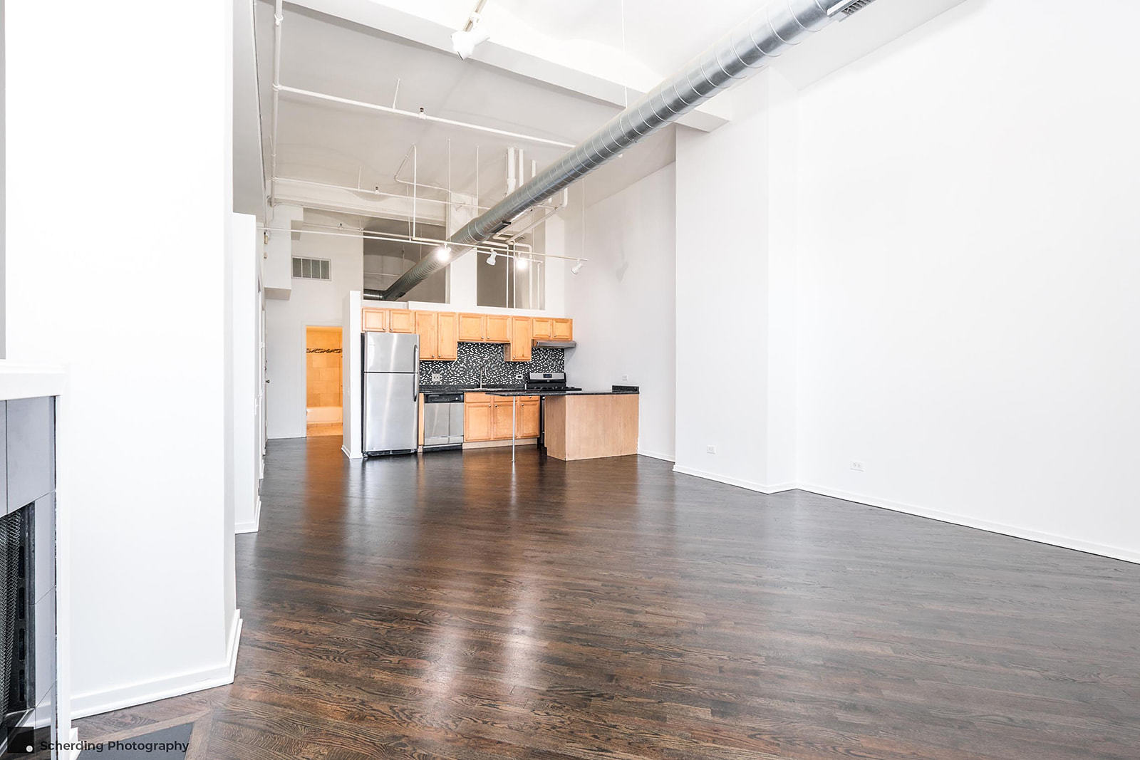 500 South Clinton Street, Unit 130 Chicago, IL 60607 - Photo 9 of 17 a view of main area with wooden floor