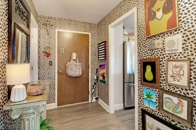 a kitchen with cabinets appliances and a sink