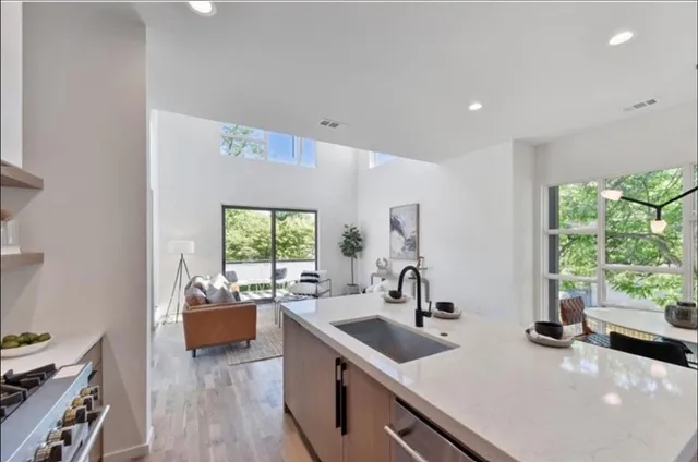 a dining room with furniture window and outside view