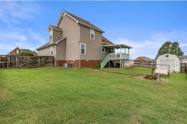 a front view of house with garden