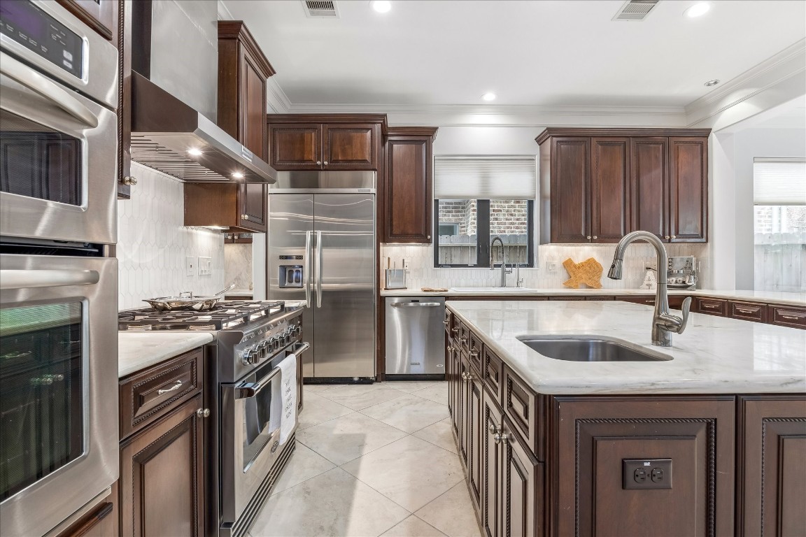 4022 Coleridge Street Houston, TX 77005 - Photo 9 of 31 Another view of this chef's kitchen with double sinks to provide lots of space for cooking and entertaining.