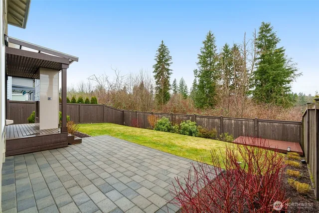 a view of a backyard with a small cabin