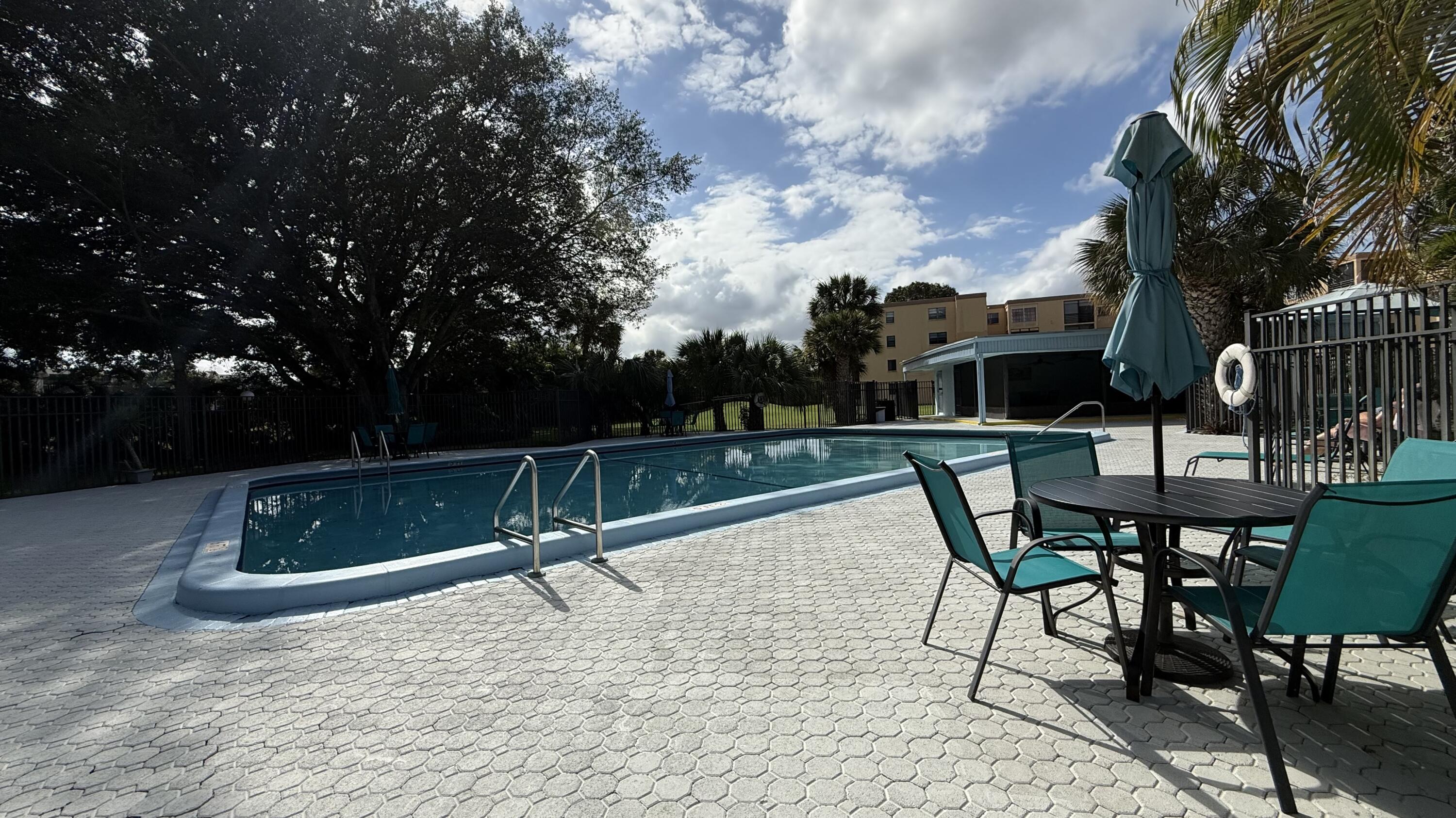 9440 Southwest 8th Street, Unit 314 Boca Raton, FL 33428 - Photo 28 of 30 a view of outdoor space yard and patio