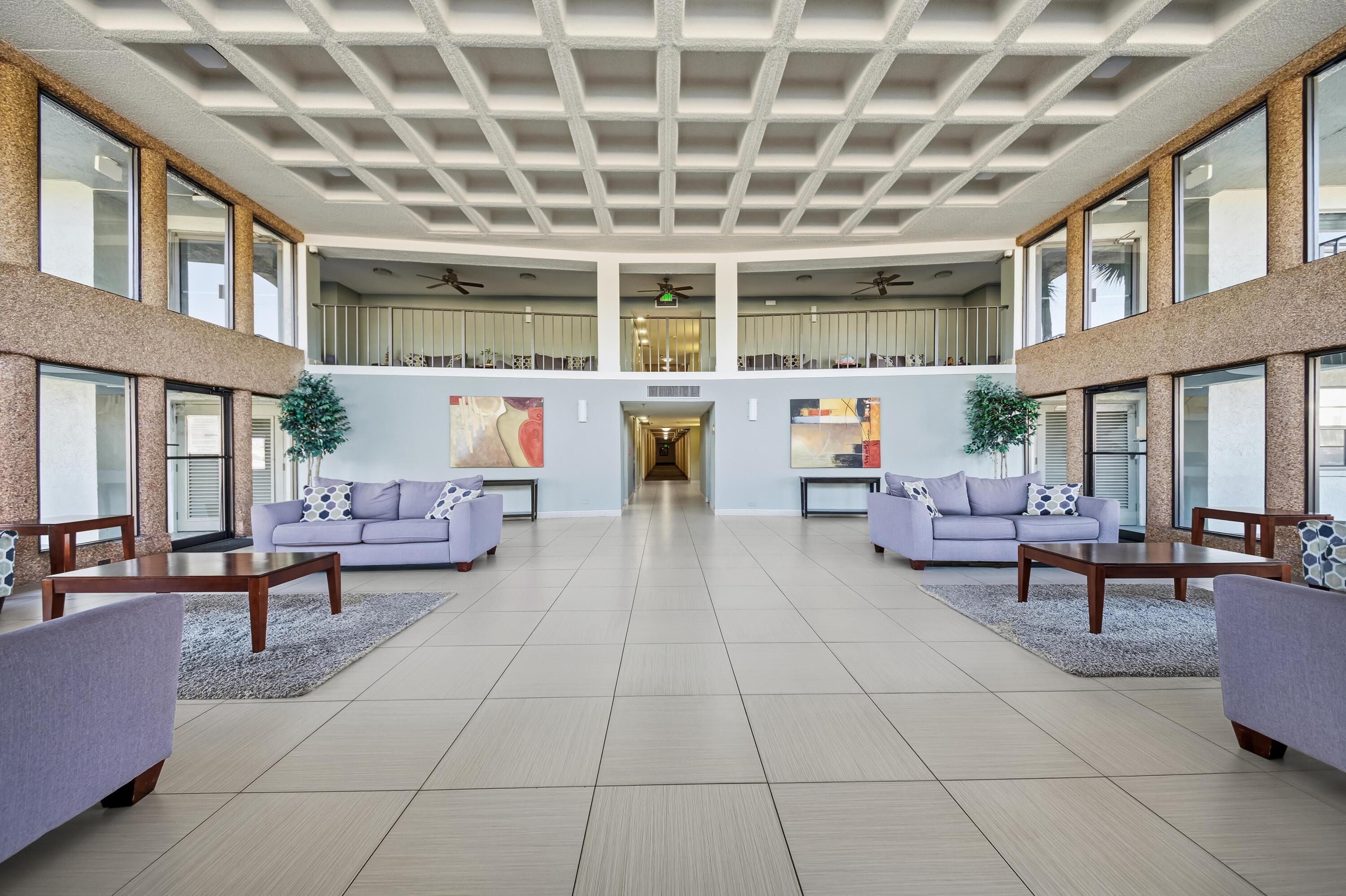 9440 Southwest 8th Street, Unit 314 Boca Raton, FL 33428 - Photo 29 of 30 a living room with furniture