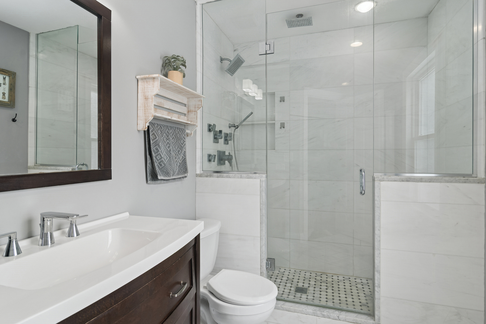 469 Pheasant Ridge Road Lake Zurich, IL 60047 - Photo 18 of 20 a bathroom with a sink a toilet and shower