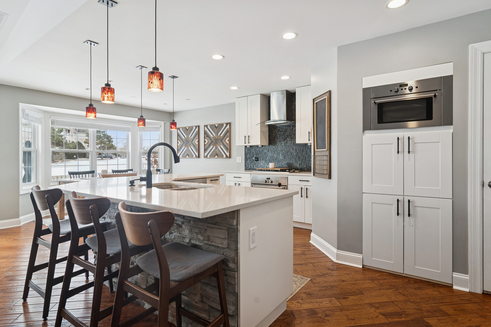 469 Pheasant Ridge Road Lake Zurich, IL 60047 - Photo 4 of 20 a kitchen with stainless steel appliances kitchen island granite countertop a sink and a refrigerator