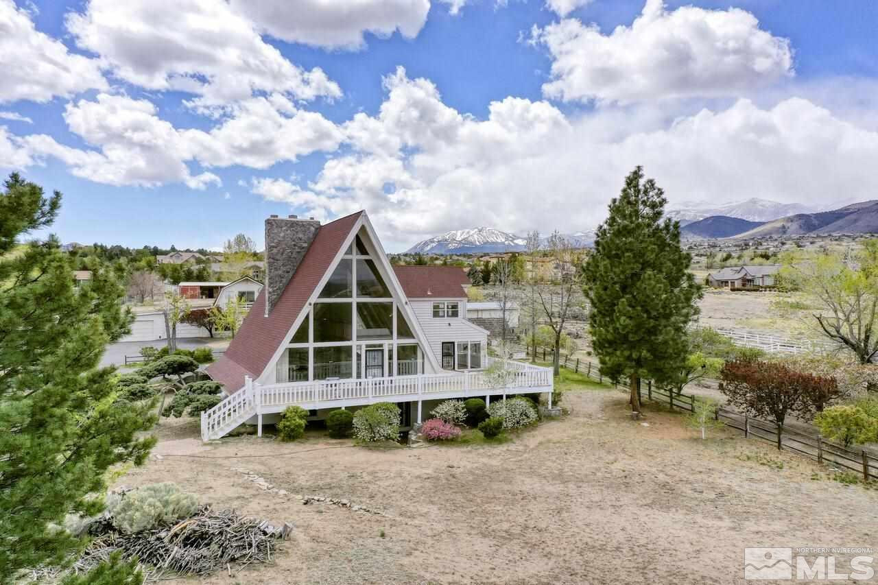 1940 Foothill Road Reno, NV 89511 - Photo 1 of 40 a front view of a house with a yard