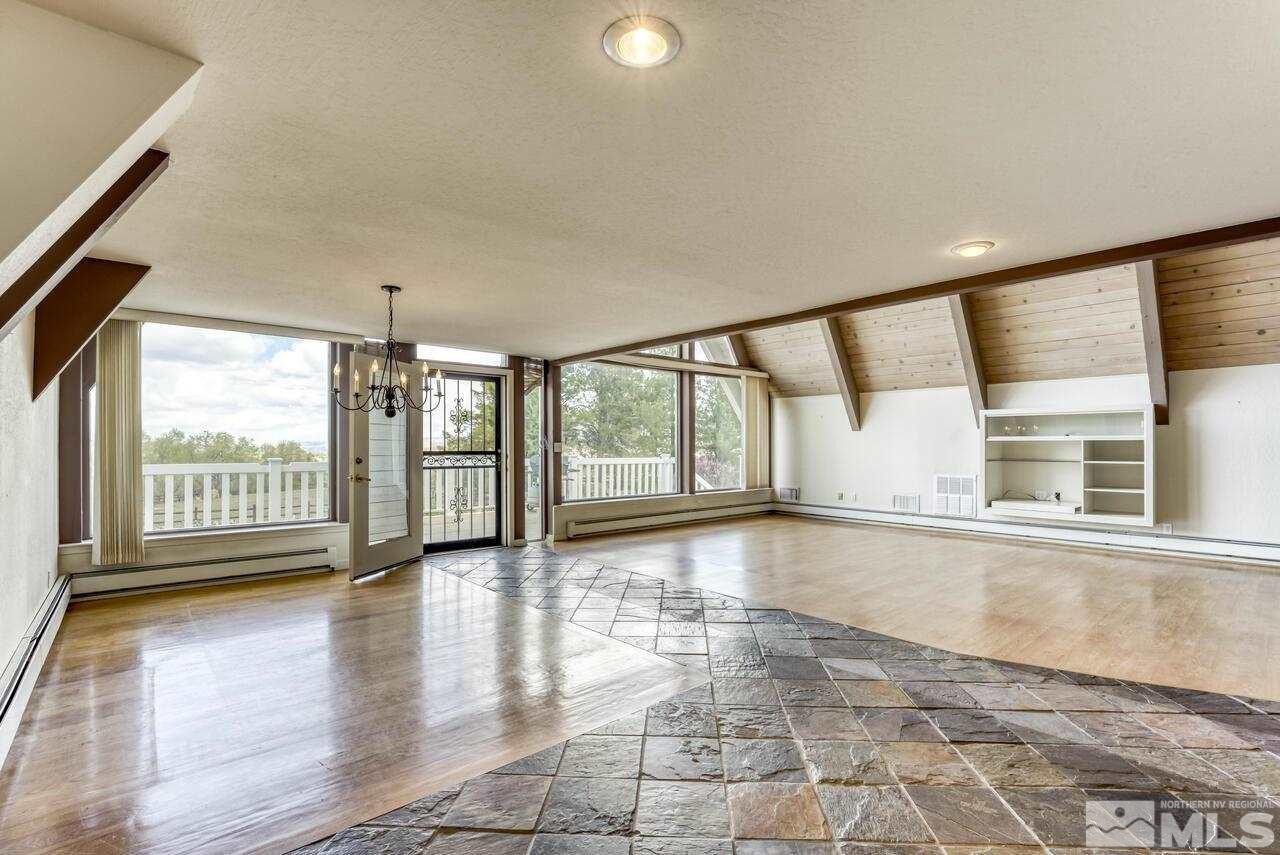 1940 Foothill Road Reno, NV 89511 - Photo 7 of 40 wooden floor in an empty room with a window