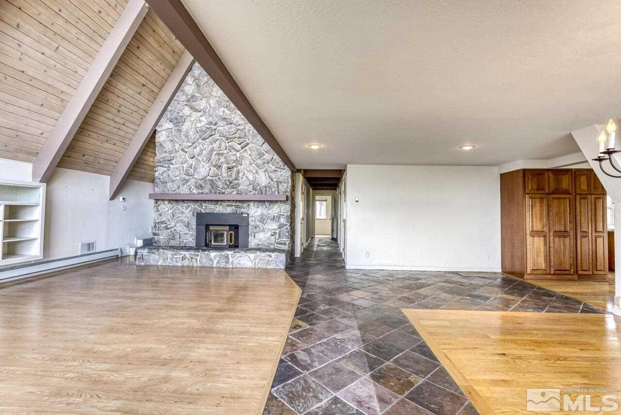 1940 Foothill Road Reno, NV 89511 - Photo 8 of 40 a view of an empty room with a fireplace