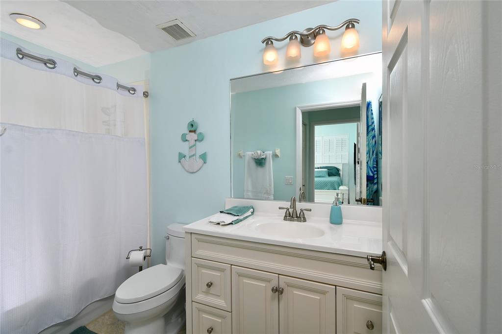 2060 Matecumbe Key Road, Unit 2102 Punta Gorda, FL 33955 - Photo 16 of 36 a bathroom with a sink toilet and shower