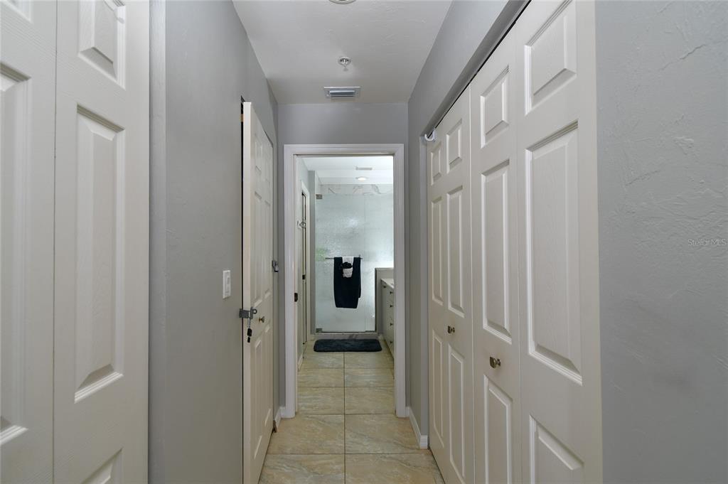 2060 Matecumbe Key Road, Unit 2102 Punta Gorda, FL 33955 - Photo 21 of 36 a view of a hallway with a wooden door