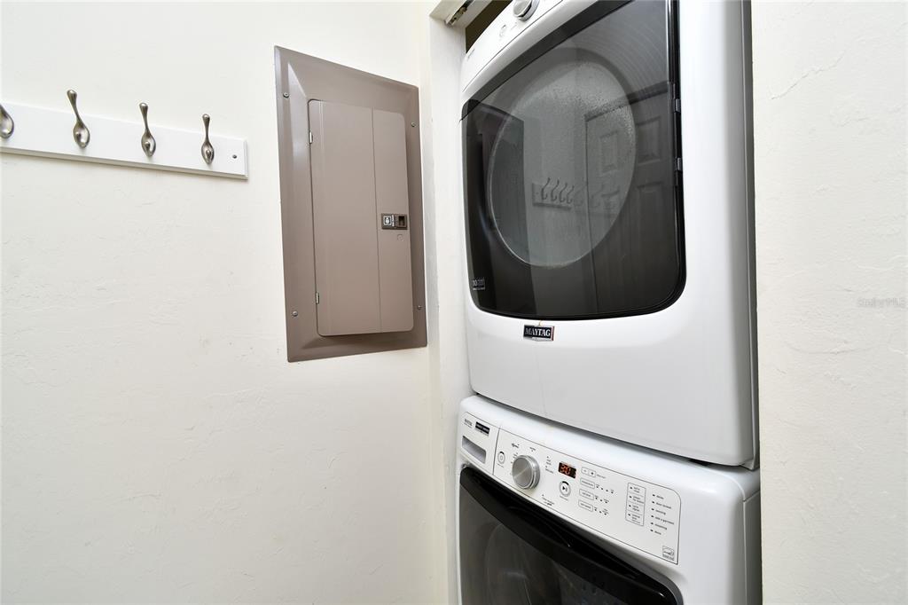2060 Matecumbe Key Road, Unit 2102 Punta Gorda, FL 33955 - Photo 28 of 36 a utility room with dryer and washer