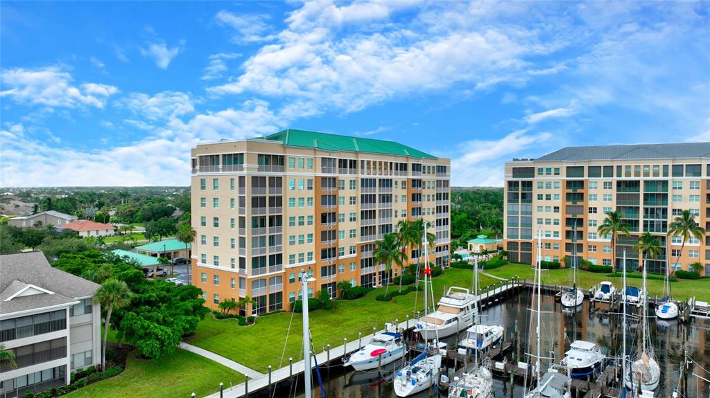 2060 Matecumbe Key Road, Unit 2102 Punta Gorda, FL 33955 - Photo 33 of 36 a front view of a building with garden