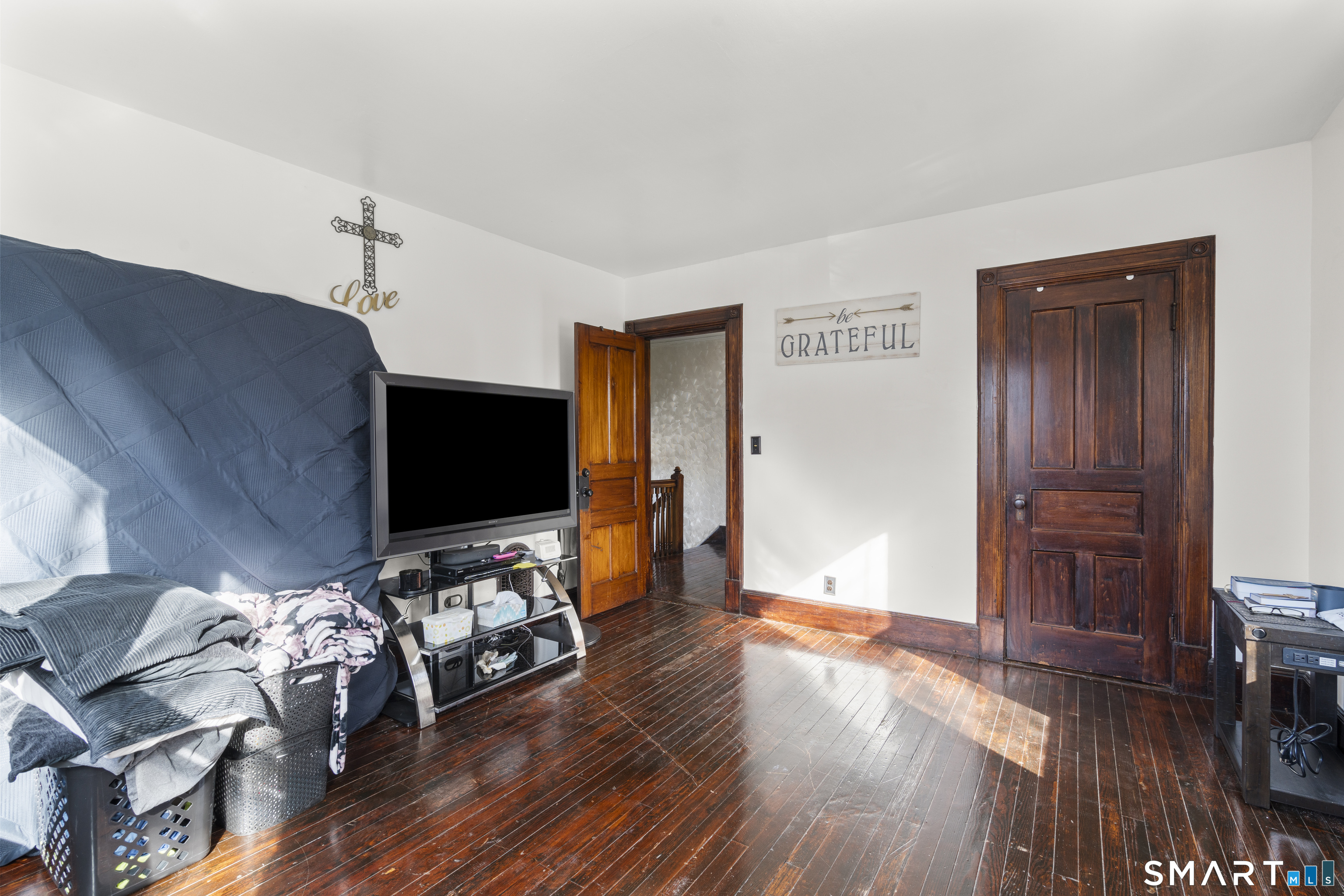 101 Wilcox Avenue Meriden, CT 06451 - Photo 13 of 43 a living room with furniture and a flat screen tv