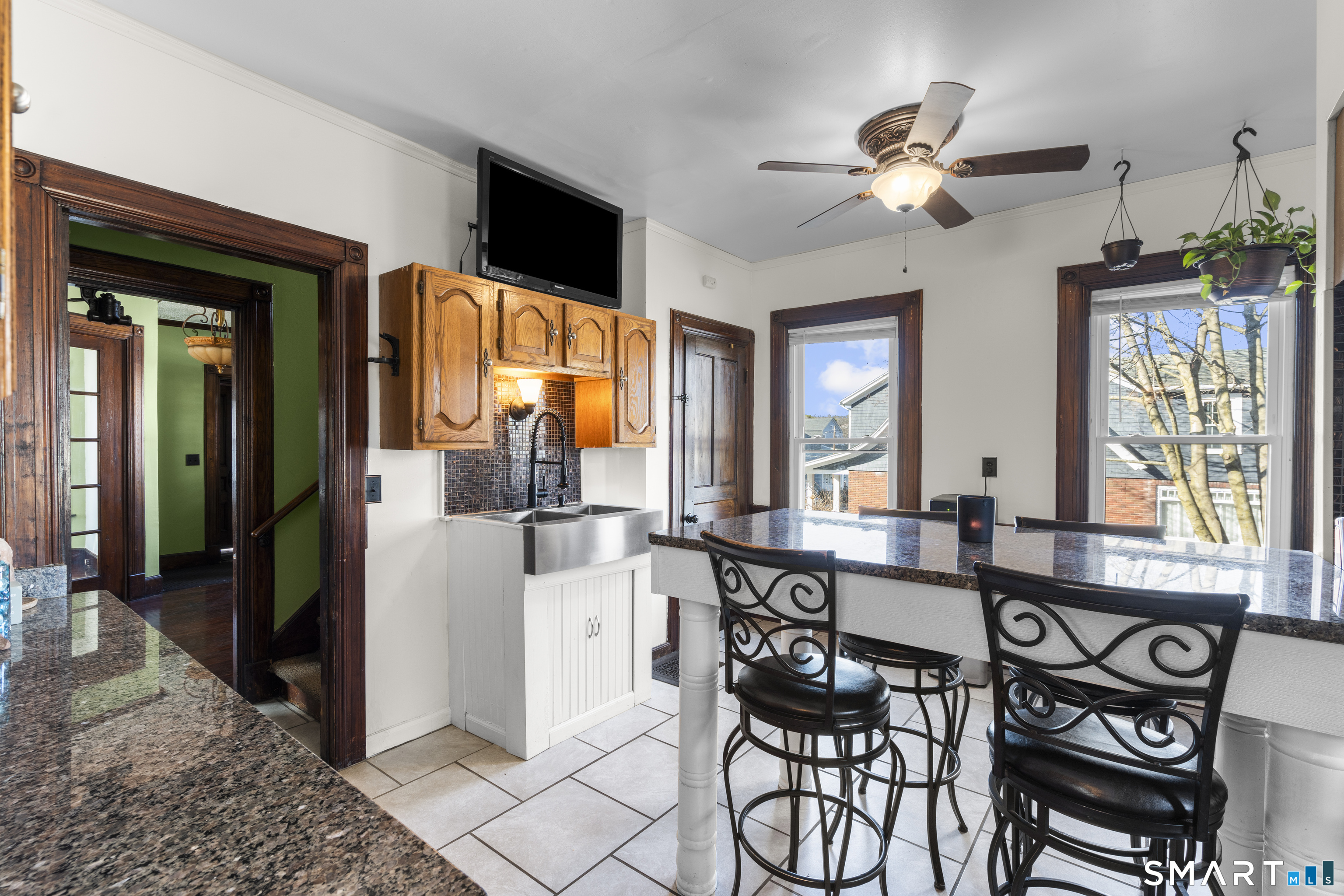 101 Wilcox Avenue Meriden, CT 06451 - Photo 19 of 43 a view of a dining room with furniture window and wooden floor