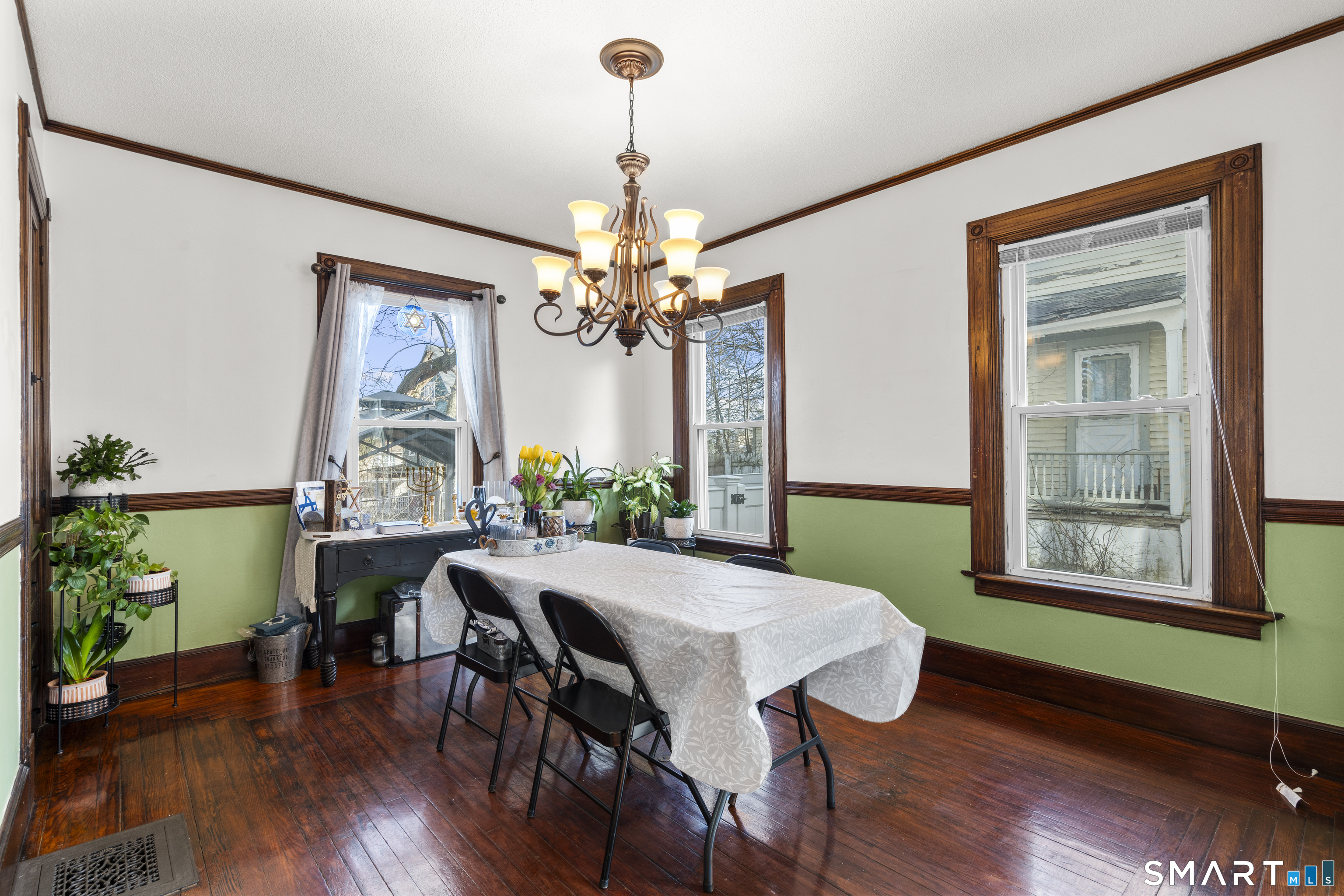 101 Wilcox Avenue Meriden, CT 06451 - Photo 22 of 43 a view of a dining room with furniture window and wooden floor