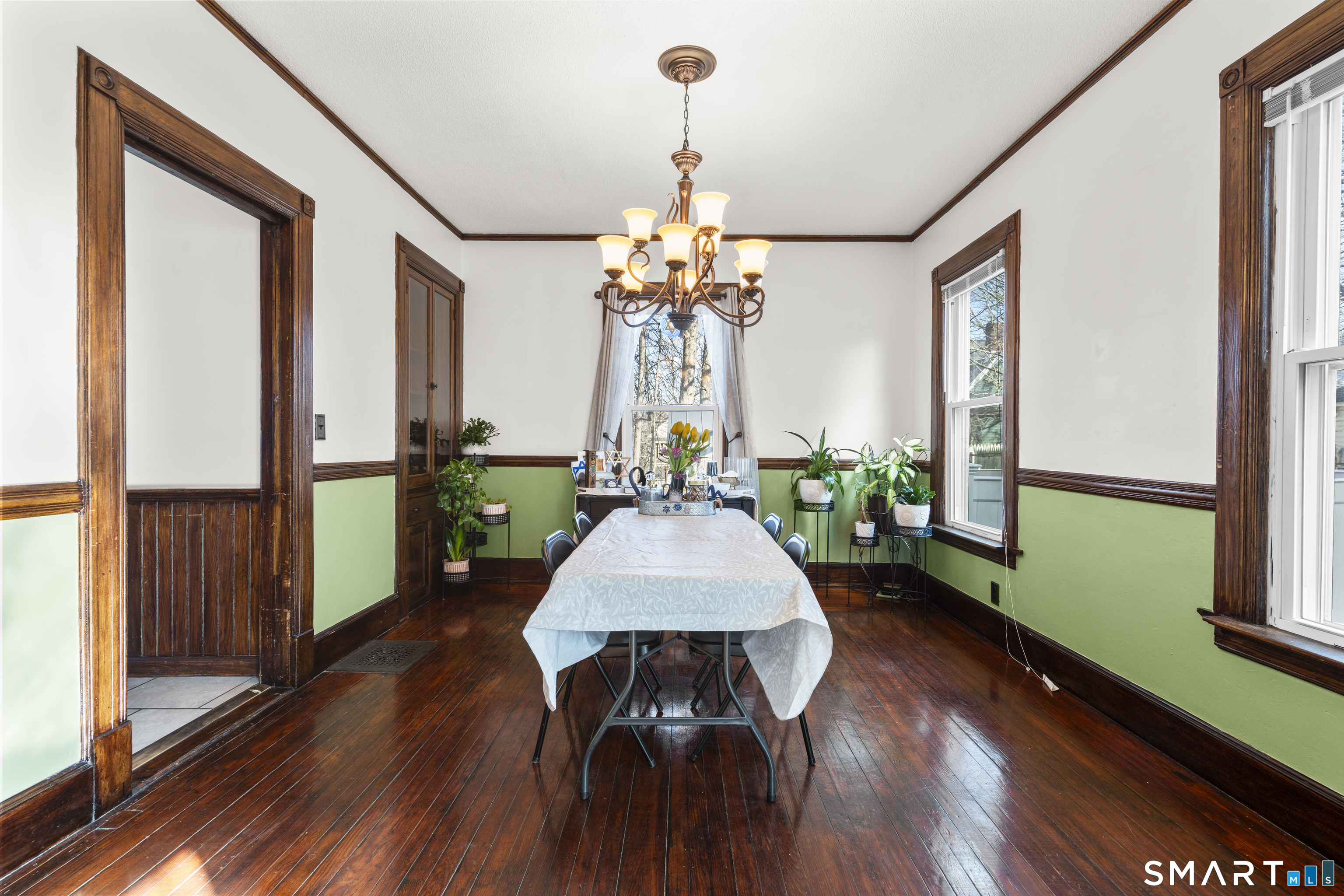 101 Wilcox Avenue Meriden, CT 06451 - Photo 24 of 43 a view of a dining room with furniture window and wooden floor